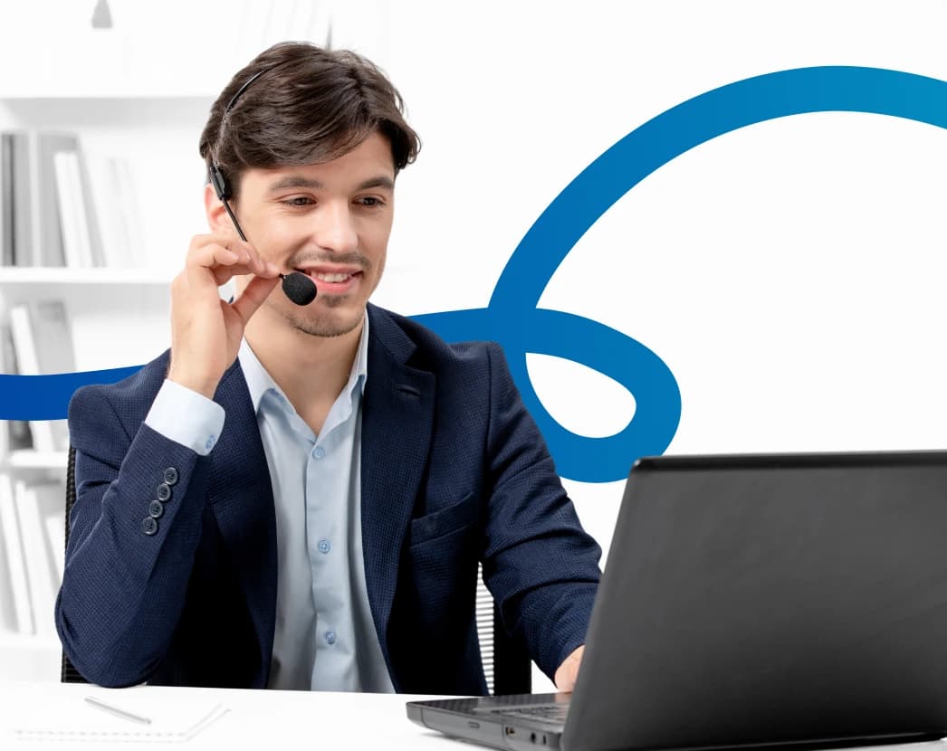 a man is using headset and smiling